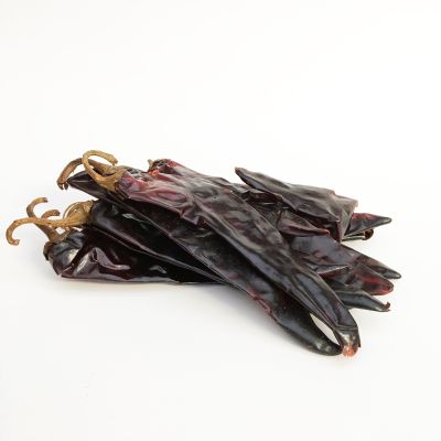 Whole dried Guajillo chilli